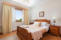 Posteľ alebo postele v izbe v ubytovaní Villa Teix de Bonaire para 10, jardines y vista mar