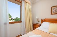 Posteľ alebo postele v izbe v ubytovaní Villa Teix de Bonaire para 10, jardines y vista mar