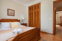 Posteľ alebo postele v izbe v ubytovaní Villa Teix de Bonaire para 10, jardines y vista mar