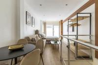 Część wypoczynkowa w obiekcie Magnifique Appartement avec Sauna et Jacuzzi