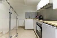 Kuchnia lub aneks kuchenny w obiekcie Magnifique Appartement avec Sauna et Jacuzzi