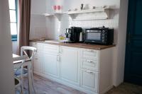 Kuchyň nebo kuchyňský kout v ubytování Mikulov Apartmány MAGISTR