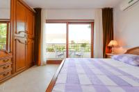 Łóżko lub łóżka w pokoju w obiekcie Rooms & Apartments Hegic