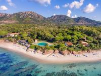 an aerial view of a resort on a beach at Luna Sardinia in Santa Margherita di Pula