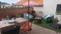 Część wypoczynkowa w obiekcie Appartement cosy en cœur de bourg