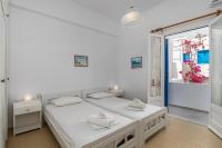 Posteľ alebo postele v izbe v ubytovaní Apollon Rooms
