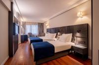 Postel nebo postele na pokoji v ubytování BW Izmir Hotel