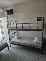 A bed or beds in a room at Villa Giannis 2
