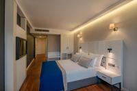 Postel nebo postele na pokoji v ubytování BW Izmir Hotel