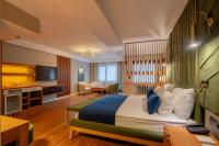 Postel nebo postele na pokoji v ubytování BW Izmir Hotel