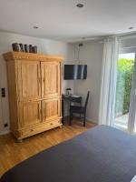 Televízia a/alebo spoločenská miestnosť v ubytovaní Zimmer Room Trogir Kastela Split
