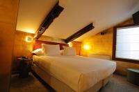 A bed or beds in a room at Ai Due Fanali Adults Only