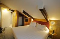 A bed or beds in a room at Ai Due Fanali Adults Only