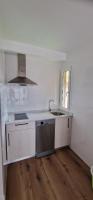 Kuchyň nebo kuchyňský kout v ubytování Apartamentos Suaces