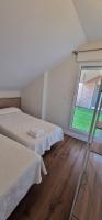 Postel nebo postele na pokoji v ubytování Apartamentos Suaces