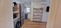 Kuchyň nebo kuchyňský kout v ubytování Apartamentos Suaces