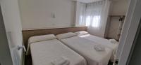 Postel nebo postele na pokoji v ubytování Apartamentos Suaces