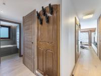Łóżko lub łóżka w pokoju w obiekcie Appartement de Standing à Megève, 5 Min des Pistes, Sauna, Hammam, Parking, Animaux Acceptés - FR-1-569-52