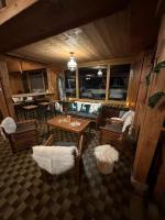 Гостиная зона в Grand appartement atypique à la montagne avec vue unique