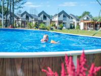 Bazén v ubytovaní Air-conditioned apartments, pool, sauna, Niechorze alebo v jeho blízkosti