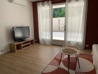 Televízia a/alebo spoločenská miestnosť v ubytovaní Casa di Como