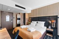 Ein Bett oder Betten in einem Zimmer der Unterkunft Park Hotel Diament Katowice