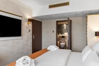 Ein Bett oder Betten in einem Zimmer der Unterkunft Park Hotel Diament Katowice