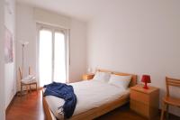 A bed or beds in a room at SVA18 Fully equipped large flat S Ambrogio
