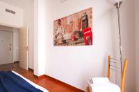 A bed or beds in a room at SVA18 Fully equipped large flat S Ambrogio