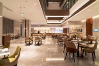 梦百合0压酒店（上海虹桥机场国家会展中心店）餐厅或其他用餐的地方