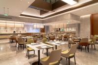 梦百合0压酒店（上海虹桥机场国家会展中心店）的休息区