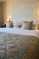 Postel nebo postele na pokoji v ubytování Sloane Square Hotel
