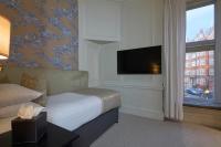 TV a/nebo společenská místnost v ubytování Sloane Square Hotel