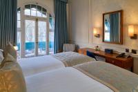 Postel nebo postele na pokoji v ubytování Sloane Square Hotel