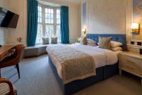 Postel nebo postele na pokoji v ubytování Sloane Square Hotel