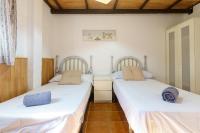 Postel nebo postele na pokoji v ubytování Cortijo rural los Erales