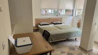 Posteľ alebo postele v izbe v ubytovaní Altea Bayview Apartment by NRAS