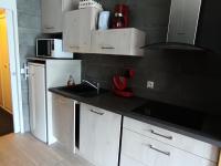 Kuchnia lub aneks kuchenny w obiekcie Résidence Olympia 2000 - Studio 4 à 5 personnes - Vue imprenable MAE-8464