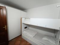Łóżko lub łóżka w pokoju w obiekcie Résidence Korossol - Joli duplex au coeur du village MAE-8634
