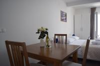 Posteľ alebo postele v izbe v ubytovaní APARTMENTS KING 2