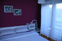 Posteľ alebo postele v izbe v ubytovaní Apartment Apolon planinski