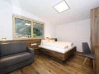Posteľ alebo postele v izbe v ubytovaní Apartment in Aschau at the lake