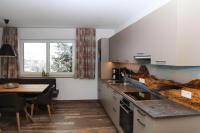 A kitchen or kitchenette at Apartment in Bramberg am Wildkogel with barbecue