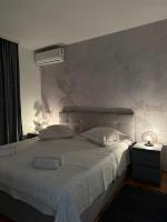 Posteľ alebo postele v izbe v ubytovaní Providenca Apartments