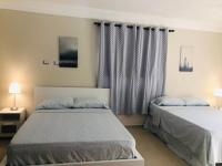Postel nebo postele na pokoji v ubytování Juan Dolio Beach Apartments