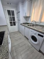 A kitchen or kitchenette at TOP APARTMENT! Frente al mar y gran terraza