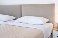Stone Palace Hotel Near Athen's Airport Free Shuttle From and to Athen's Airportにあるベッド