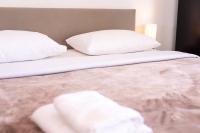 Stone Palace Hotel Near Athen's Airport Free Shuttle From and to Athen's Airportにあるベッド