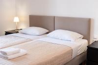 Stone Palace Hotel Near Athen's Airport Free Shuttle From and to Athen's Airportにあるベッド