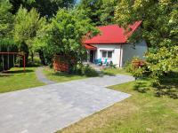 Vonkajšia záhrada v ubytovaní Apartament Zacisze
